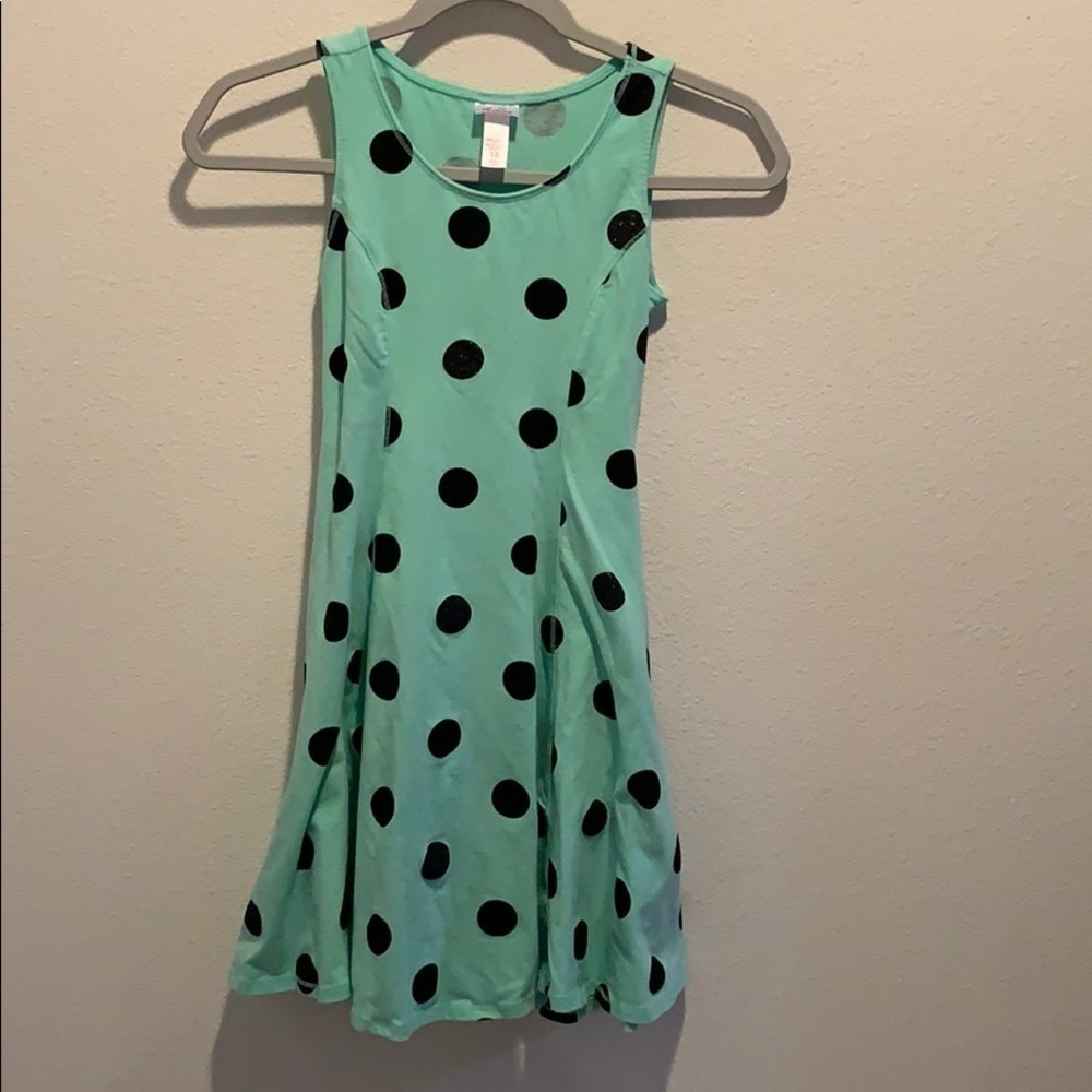 Girls fit& flair mint green with black polka dots.​​​​​​​​​​​​​​​​​​​​​​